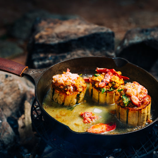 Braised Delicata Squash with Lobster and Sausage Stuffing and Bourbon Butter Pan Sauce