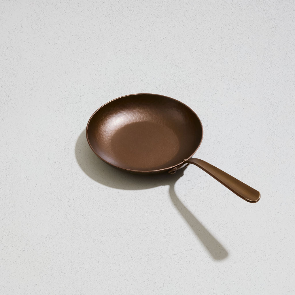 Little Farmhouse Skillet, angled overhead view of the carbon steel cooking surface