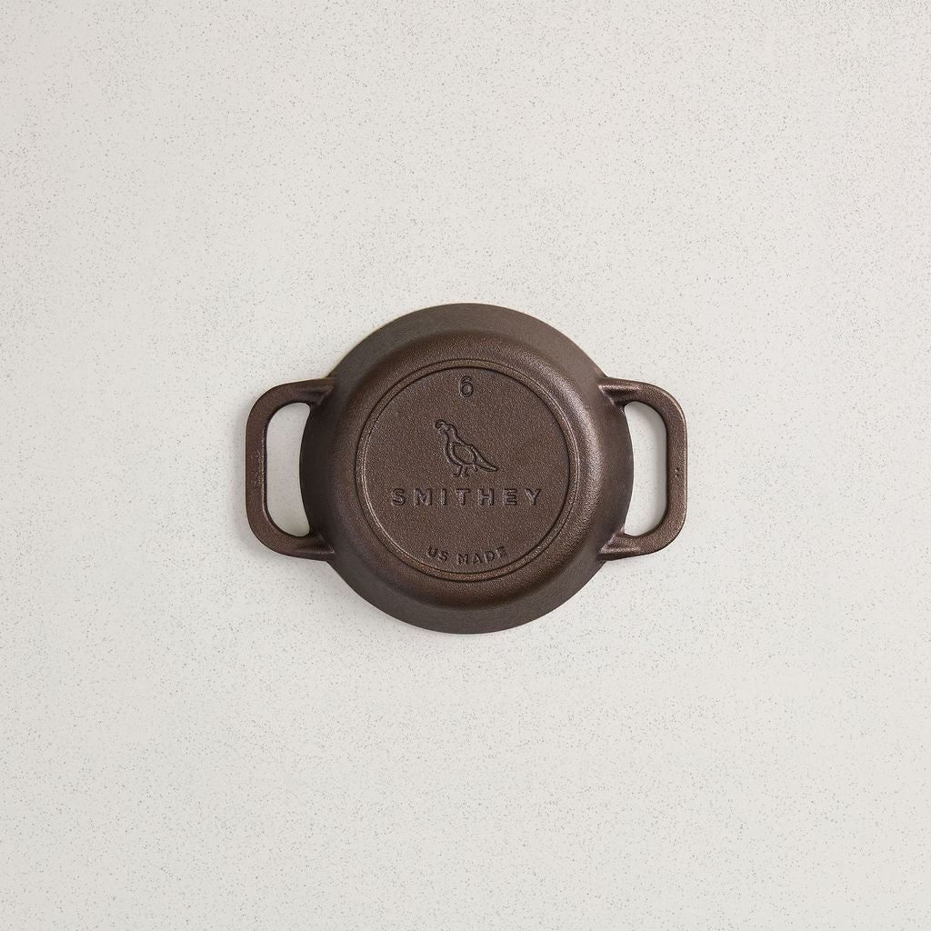 Underside of the No. 6 Dual Handle Skillet showing the cast Smithey logo