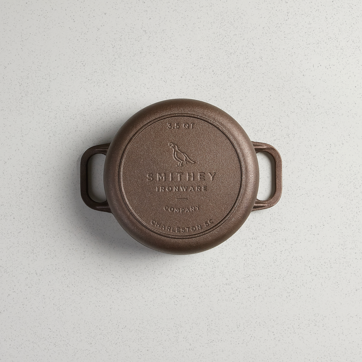 Underside of the 3.5 Qt Dutch Oven showing the cast Smithey logo
