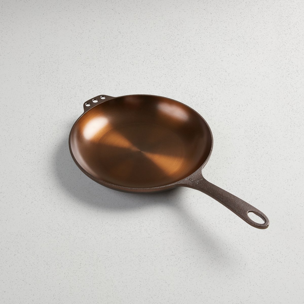No. 10 Chef Skillet, angled overhead view of the polished cooking surface