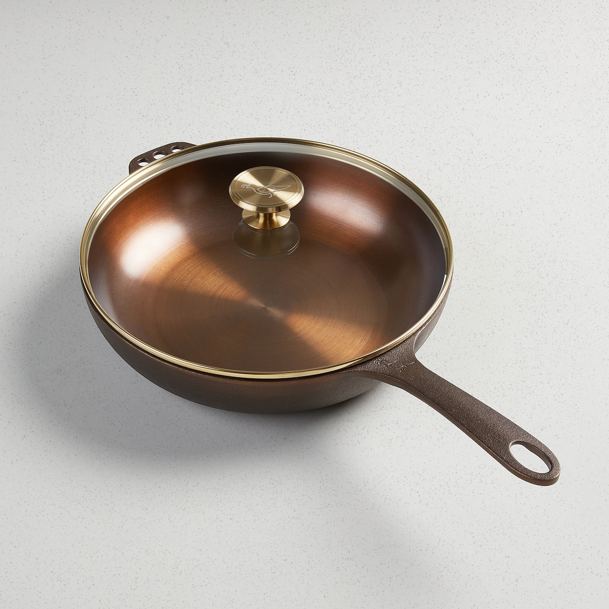 No. 11 Deep Skillet with its glass lid on, angled overhead view